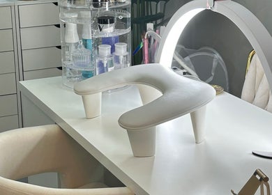 Elegant nail station setup at Le Getaway by Lexx, Marigot, GP, featuring modern lighting and manicure tools.