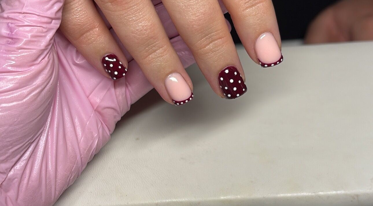 Elegant polka dot nail art at Glossed by Jorjah, Chelmsford, England, GB.