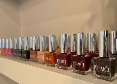 Luna & Wilde Belgravia | Victoria, BIAB Nail & Hair Salon in London, England, GB featuring vibrant nail polishes.