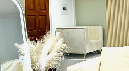 Elegant seating area at My Beauty Emporium, Centurion, Gauteng, ZA, featuring plush decor and ambient lighting.