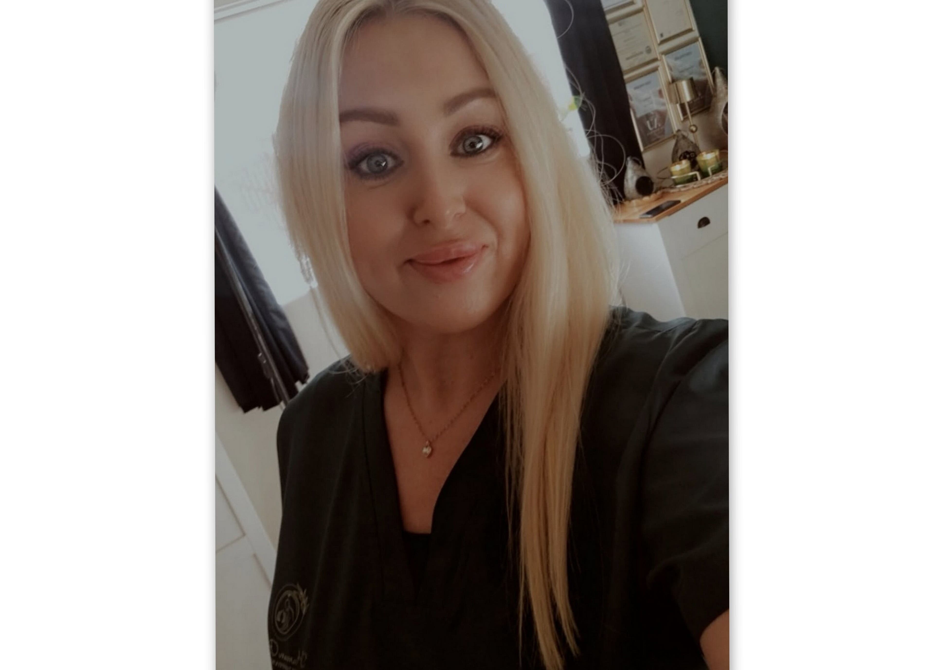 A smiling professional at Human Balance, Glasgow, Scotland, GB, providing wellness and beauty services.