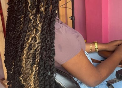 Styled braided hair at Curl Pride gy, West Bank Demerara, GY, showcasing expert beauty techniques.