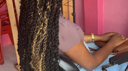 Styled braided hair at Curl Pride gy, West Bank Demerara, GY, showcasing expert beauty techniques.