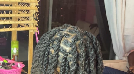 Intricate hair twists at Curl Pride GY, West Bank Demerara, GY showcasing expert styling.