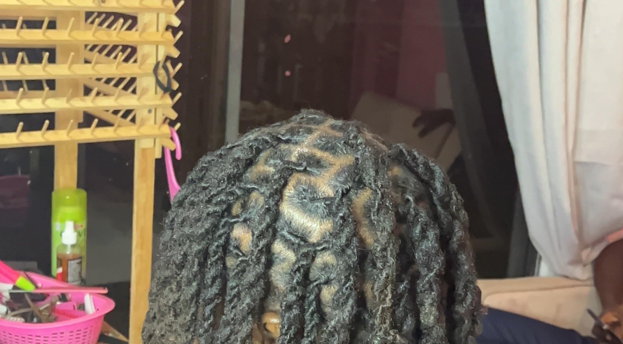 Intricate hair twists at Curl Pride GY, West Bank Demerara, GY showcasing expert styling.