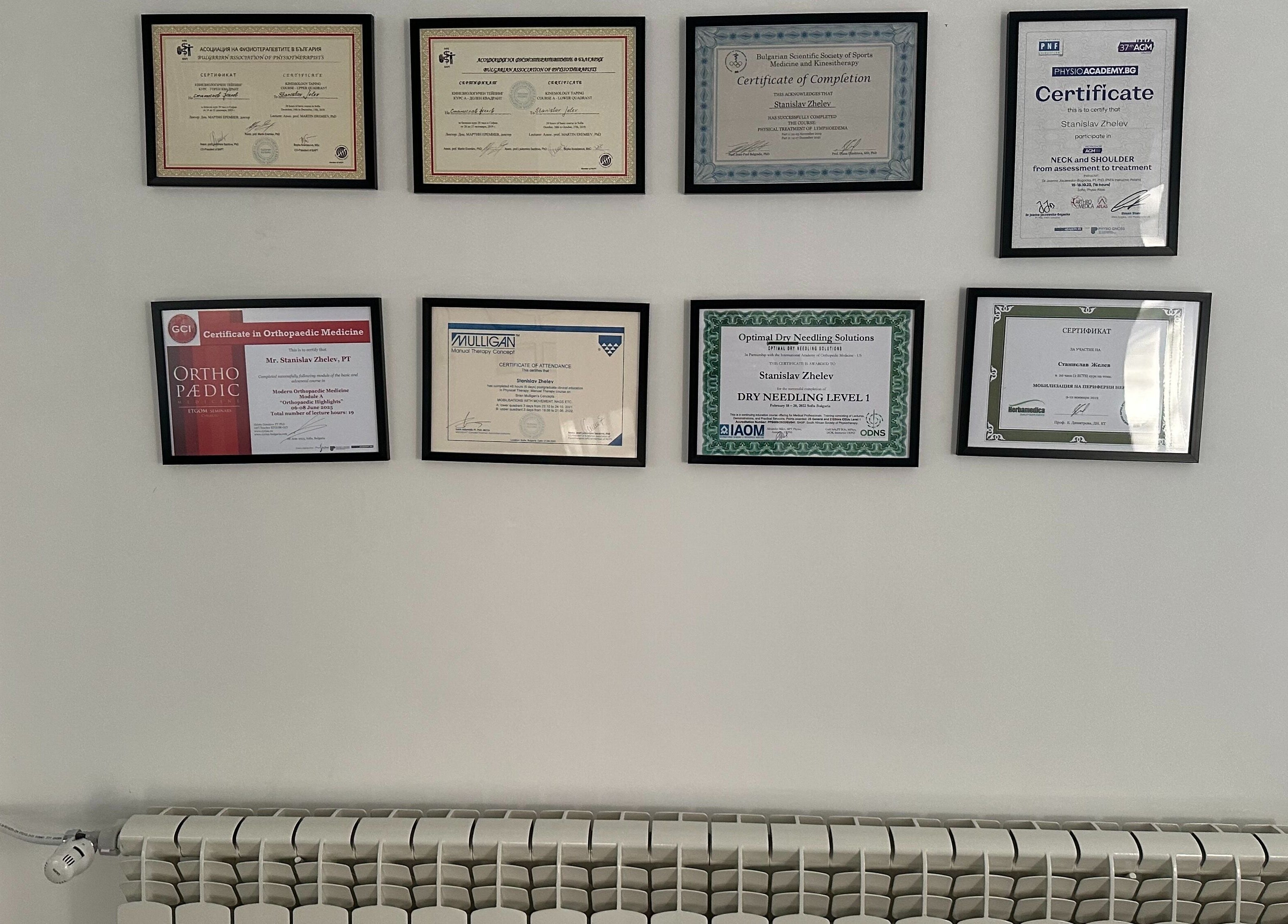 Сертификати на стената в SJ Physio & Pilates, София, Област София, BG, показващи професионализъм.