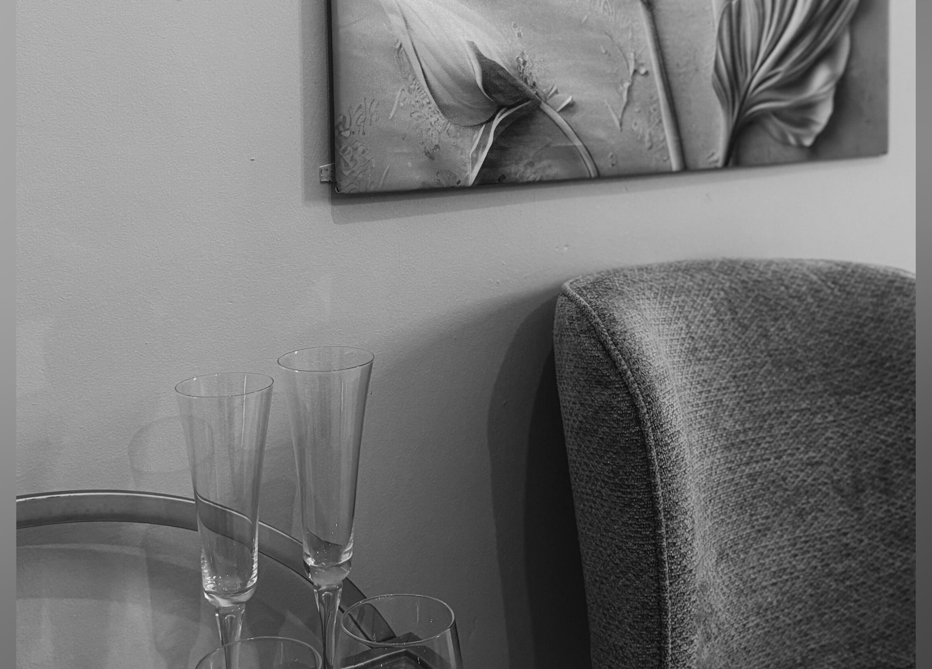 Aesthetic Hair's serene corner in Stellenbosch, Western Cape, ZA with art and chic seating.