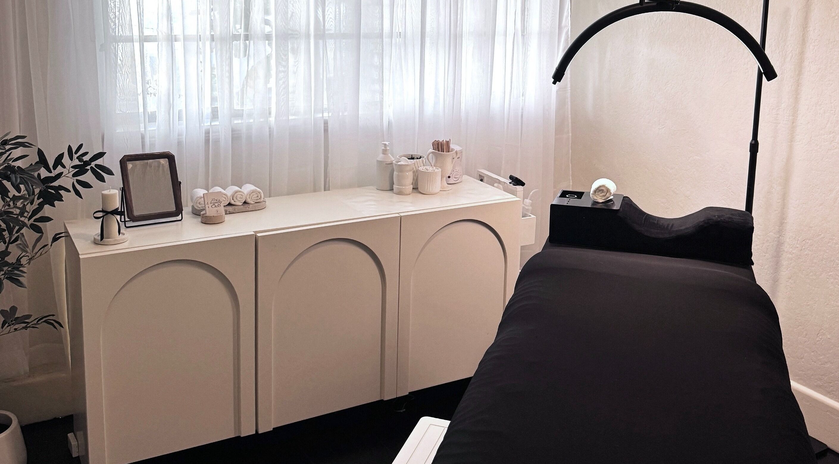 Elegant treatment room at Studio Silk, Melbourne, Victoria, AU with massage bed and soothing decor.