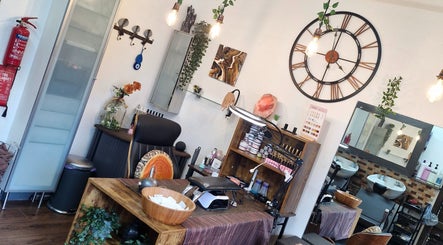 Interior view of A.S.H Beauty at Maine Salon in Huddersfield, England, GB, showcasing a modern styling area.
