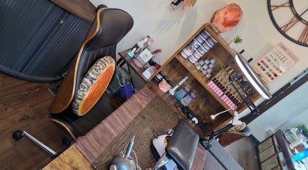Nail art station at A.S.H Beauty at Maine Salon, Huddersfield, England, GB, showcasing tools and products.