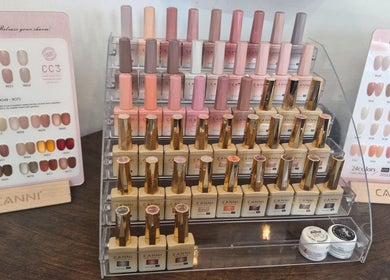 Vibrant nail polish display at A.S.H Beauty at Maine Salon, Huddersfield, England, GB.