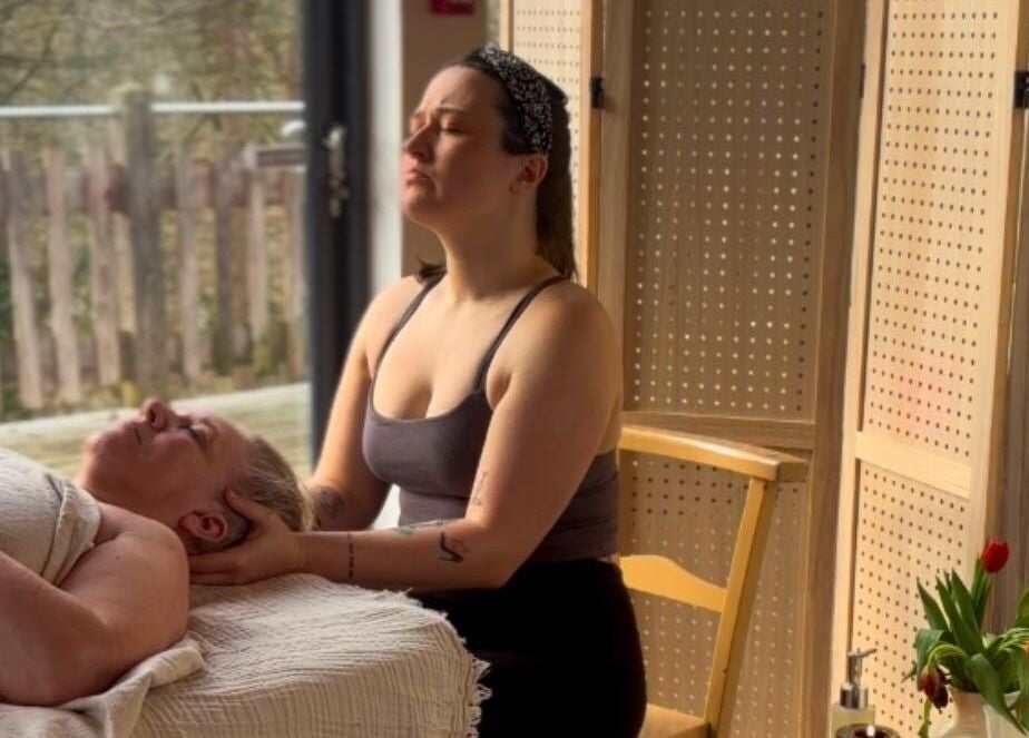 Relaxing massage at New Chapter Massage at Larchwood Studio, Hay-on-wye, Wales, GB, with a natural backdrop.