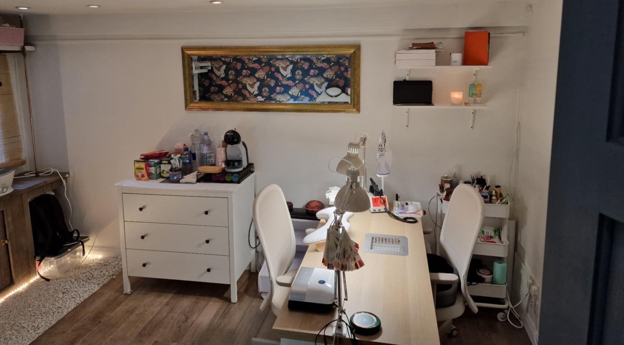 Inviting nail station at Chique Nail Studio, London, England, GB with elegant decor and organized workspace.