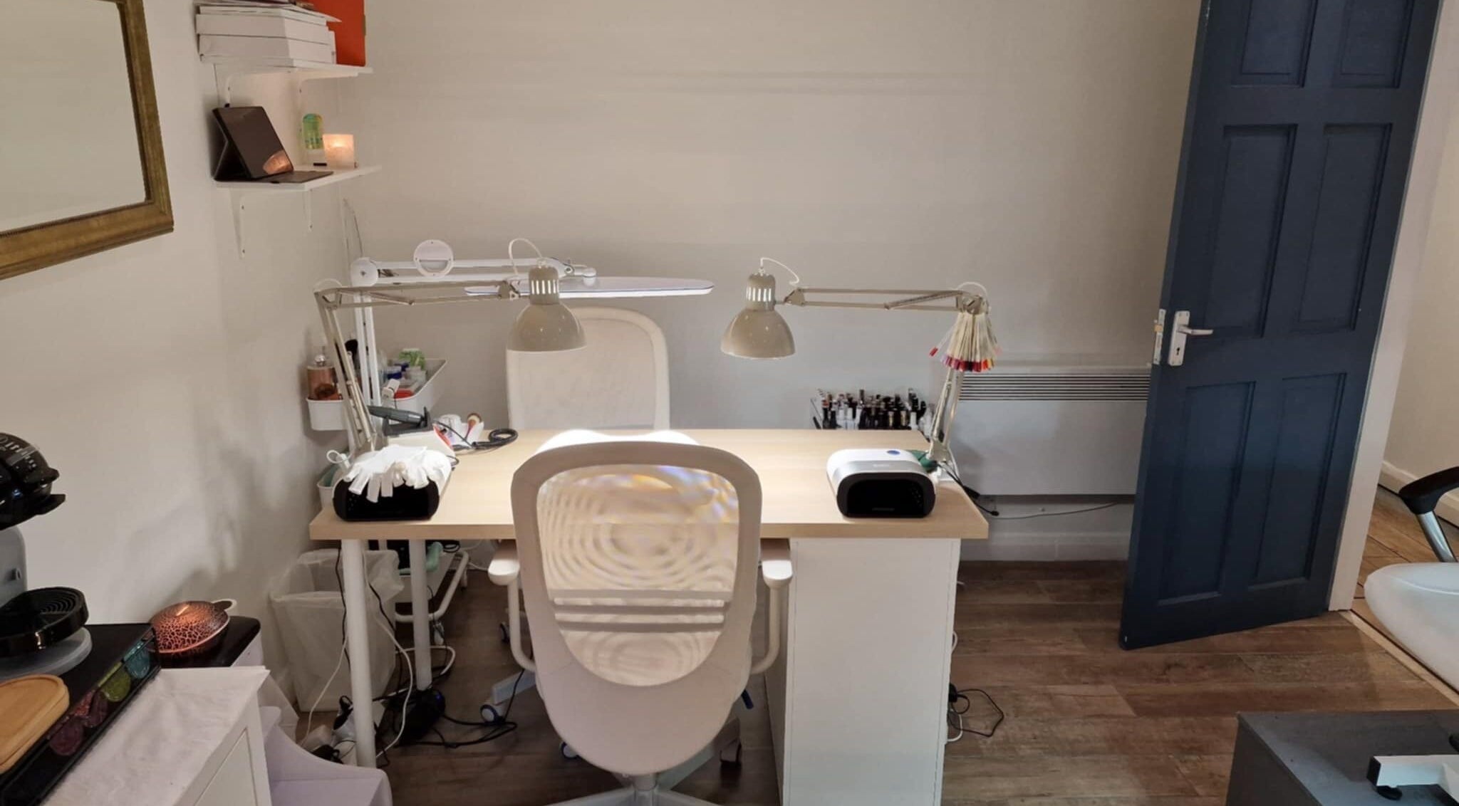 Chique Nail Studio workspace with manicure tools in London, England, GB, showcasing modern design.