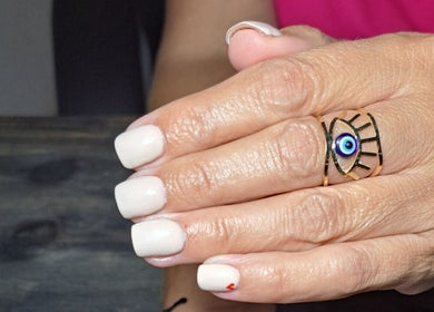 Elegant pale nails with unique ring at Ninnie's, Boksburg, Gauteng, ZA.