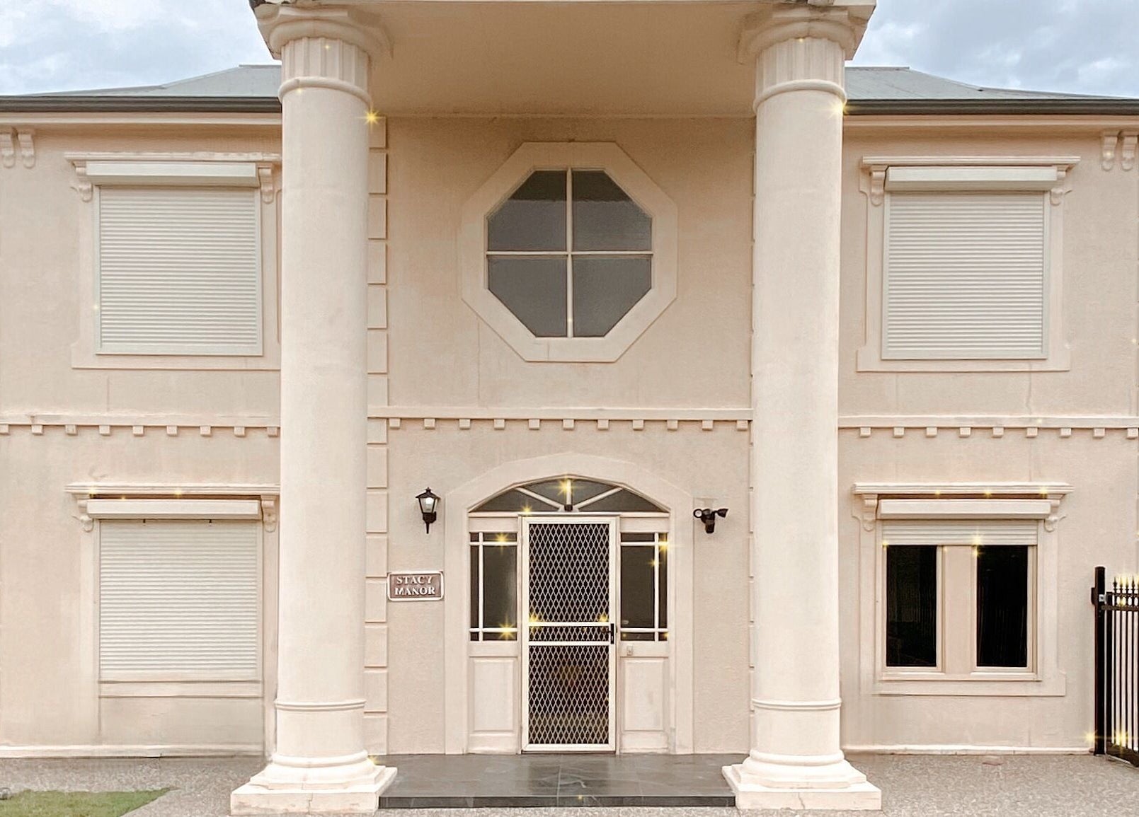 Grand entrance of Lashes at The Manor, Old Reynella, South Australia, AU with elegant columns.