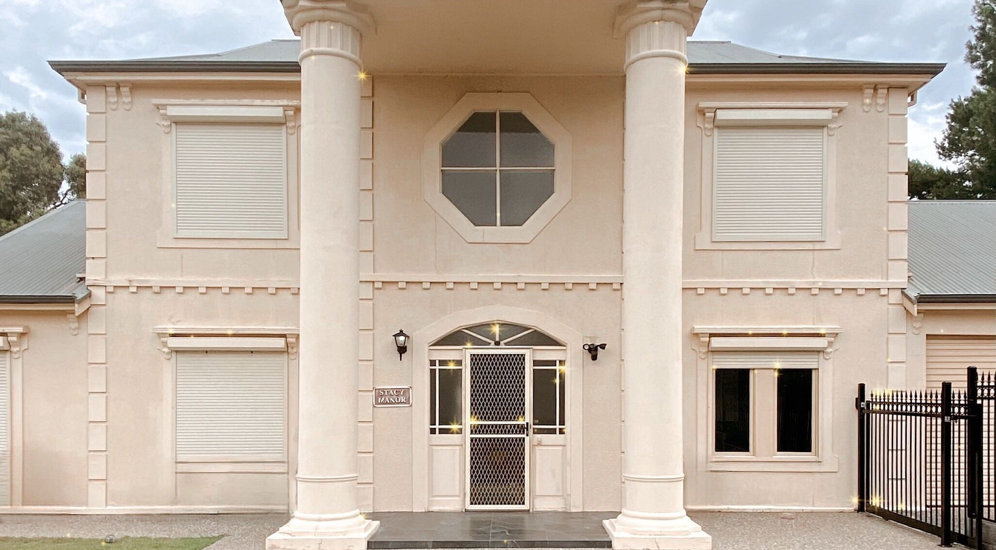 Grand entrance of Lashes at The Manor, Old Reynella, South Australia, AU with elegant columns.