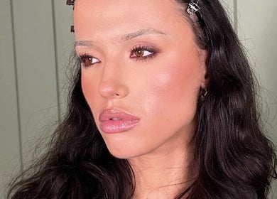 Close-up makeup look from Mikaela Kathleen Ringwood in Melbourne, Victoria, AU showing elegant eyeliner and glossy lips.