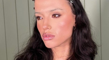 Close-up makeup look from Mikaela Kathleen Ringwood in Melbourne, Victoria, AU showing elegant eyeliner and glossy lips.