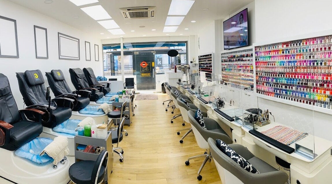 Interior of Perfect Image Nails in London, England, GB showcasing stylish manicure and pedicure stations.