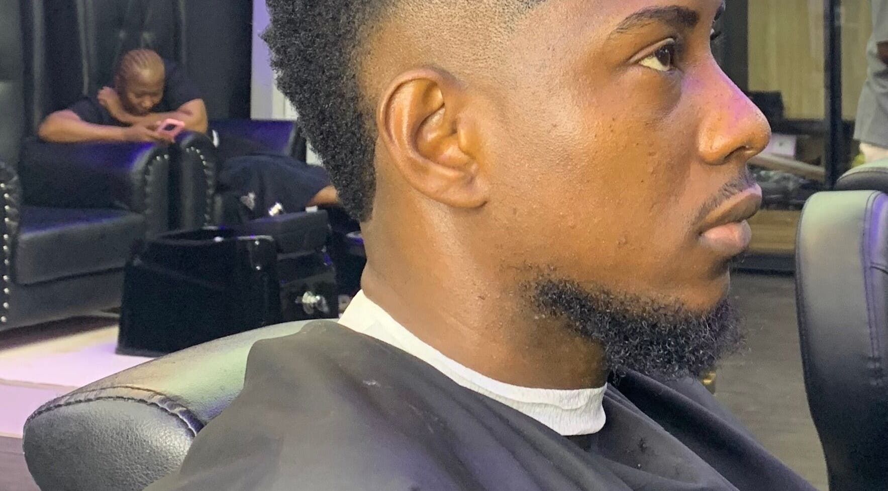 Detailed close-up of a man's haircut at Bayelsa, Yenagoa, Bayelsa, NG showing a crisp, modern style.