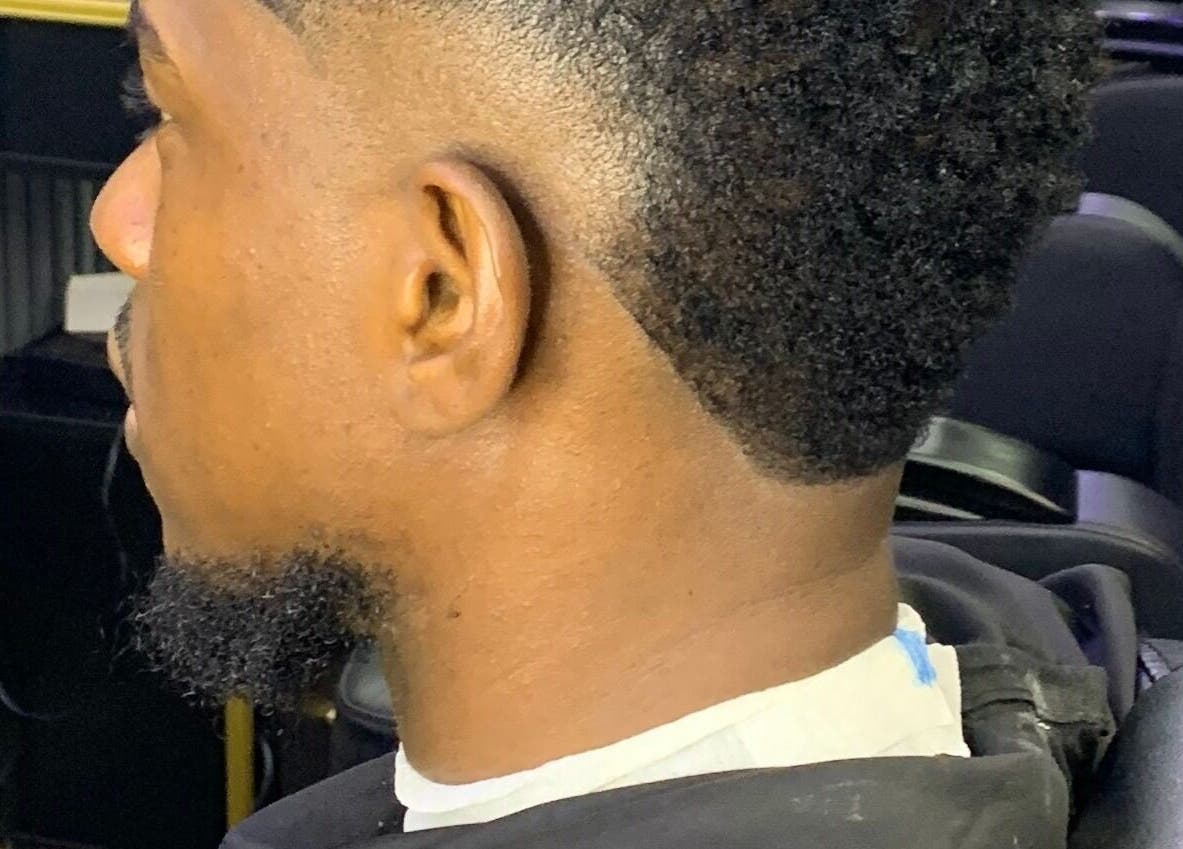 Close-up of a stylish haircut at Bayelsa in Yenagoa, Bayelsa, NG, showcasing barber skills.