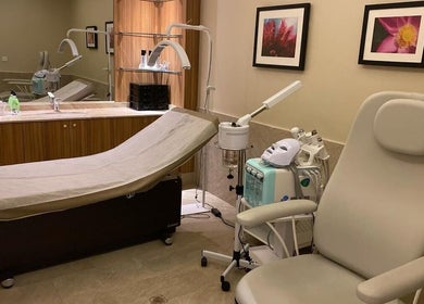 Relaxing treatment room at Ezees Beauty & Spa, Al Khobar, Eastern Province, SA, with modern equipment.