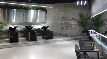 Modern salon seating and decor at Paintbox Hair Studio, Dubai, Dubai, AE, showcasing sleek, stylish design.