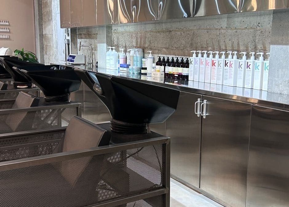 Modern shampoo stations at Paintbox Hair Studio, Dubai, Dubai, AE, featuring sleek design and professional products.