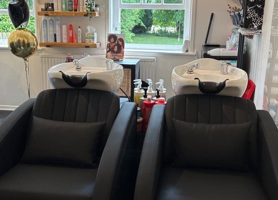Chic salon wash stations at Hair By Milly Rose, Basingstoke, England, GB with sleek, modern design.