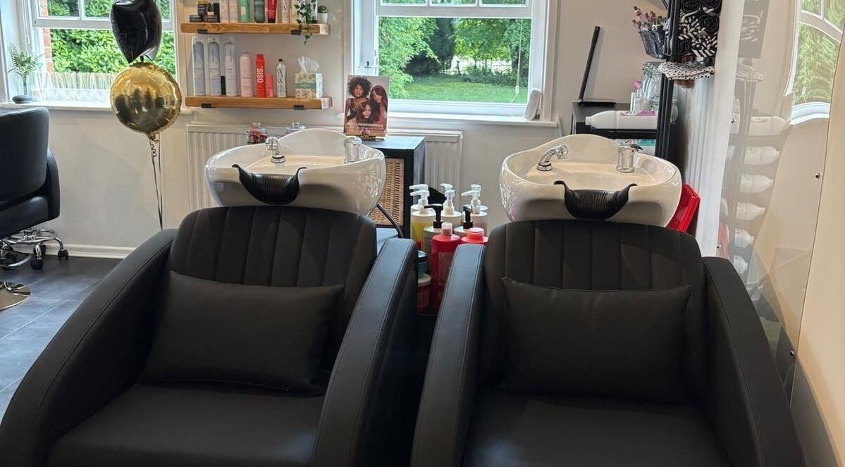 Chic salon wash stations at Hair By Milly Rose, Basingstoke, England, GB with sleek, modern design.