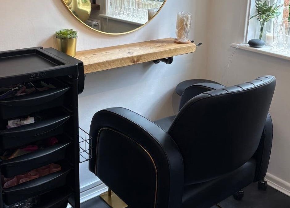 Luxurious salon chair at Hair By Milly Rose in Basingstoke, England, GB with modern decor and natural lighting.