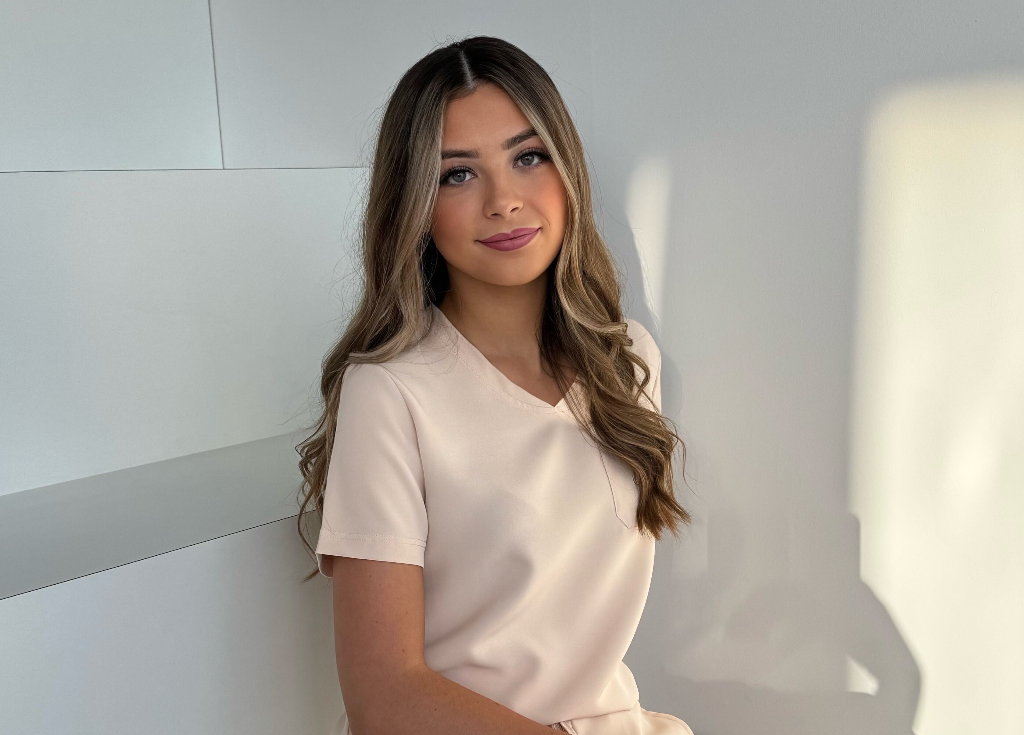 Smiling person at By Amelia, Thurmaston, England, GB, creating a warm and inviting atmosphere.