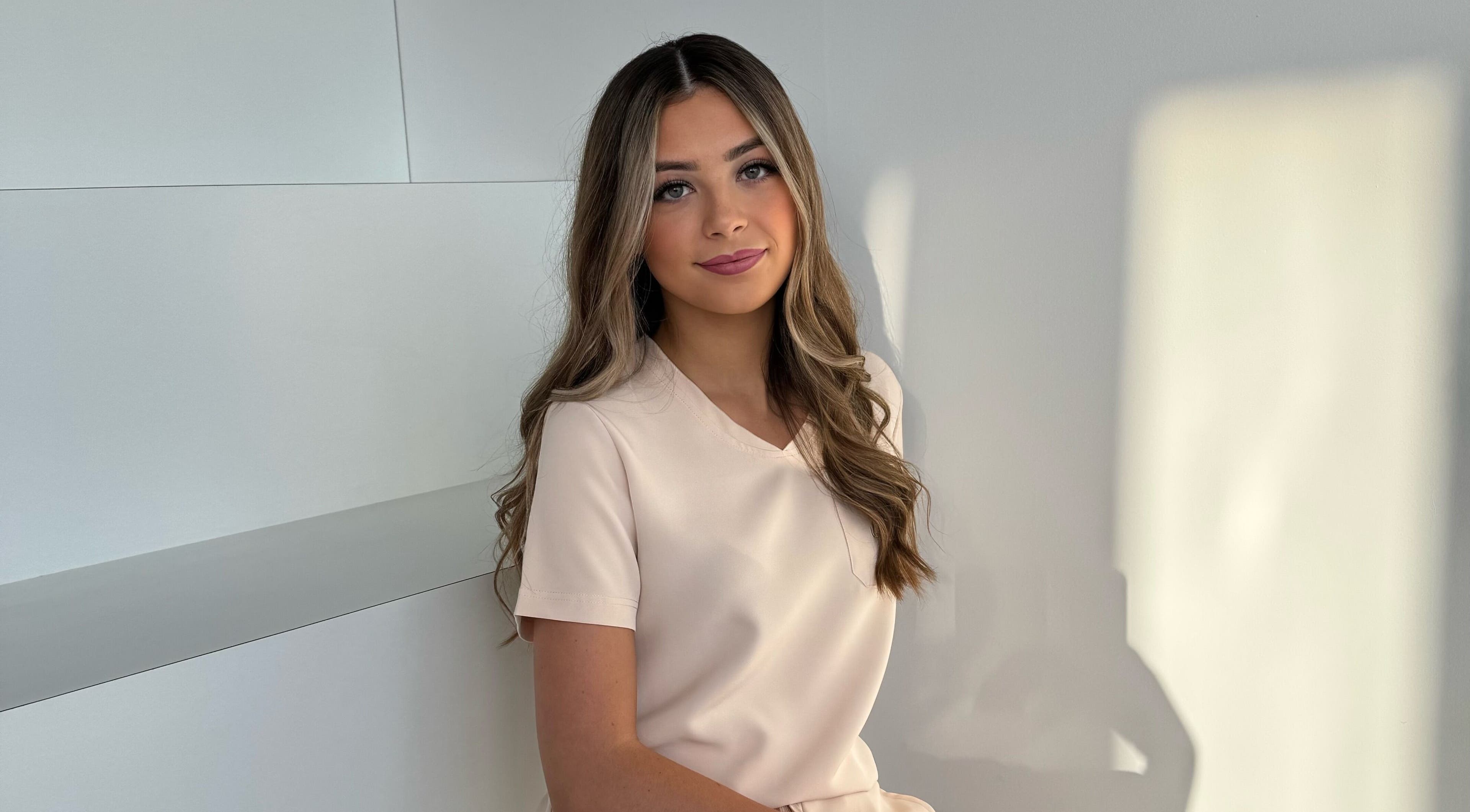 Smiling person at By Amelia, Thurmaston, England, GB, creating a warm and inviting atmosphere.