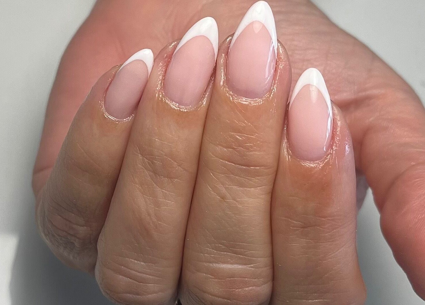Stylish French manicure at By Amelia, Thurmaston, England, GB showcases elegant nail artistry.
