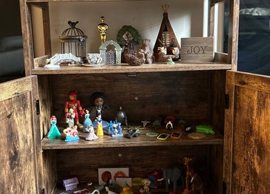 Decorative shelf with toys and trinkets at LoveFire Counseling & Joy Affiliate Providers, Lubbock, Texas, US.