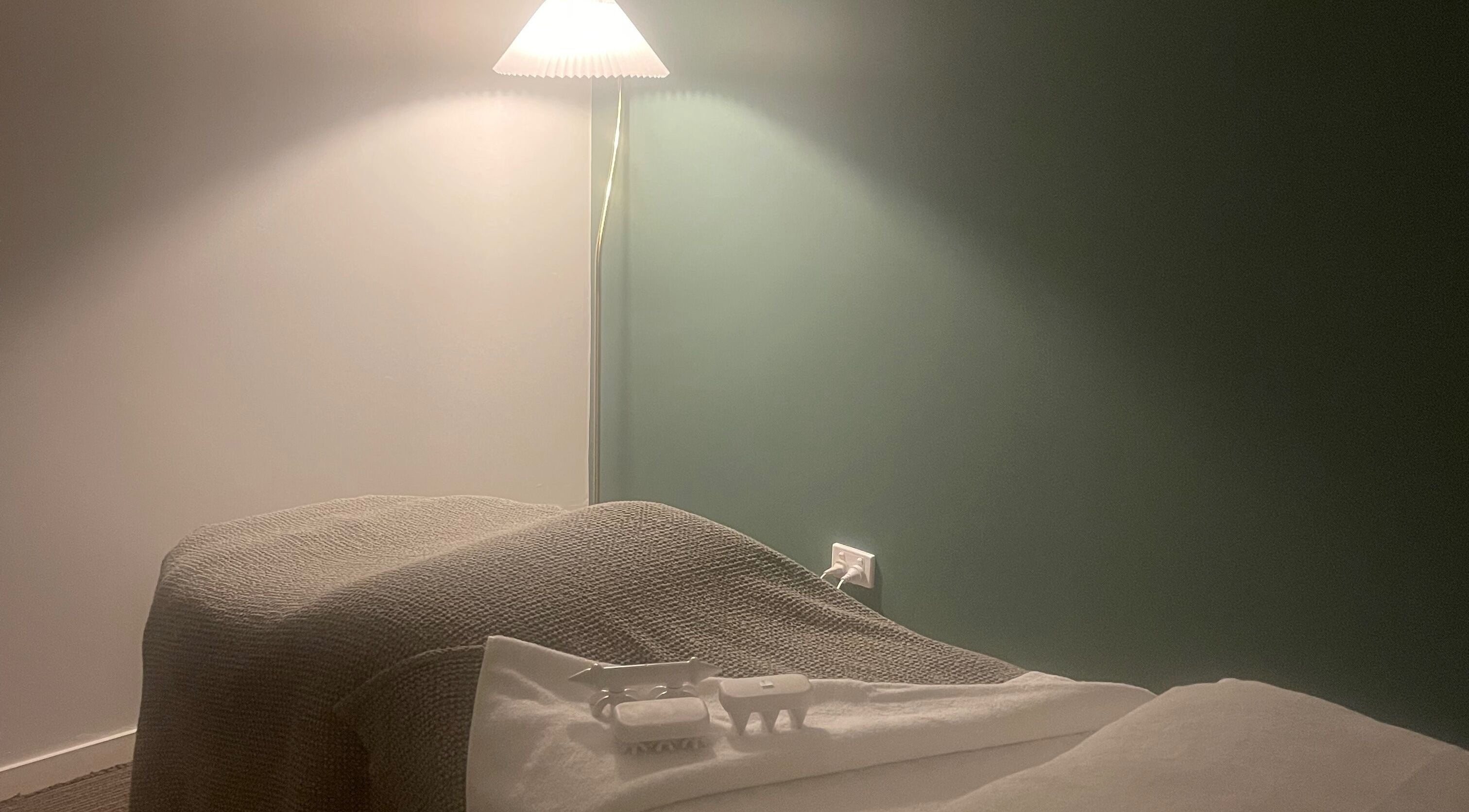 Peaceful massage room with soft lighting at The Silent Therapist in Maffra, Victoria, AU.