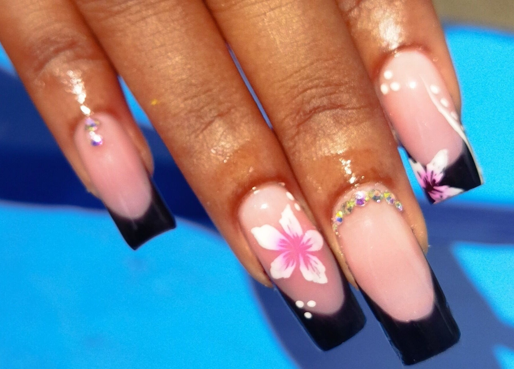 Beautiful floral nail art at Nail Therapy, Laborie, Laborie, LC showcasing intricate designs.