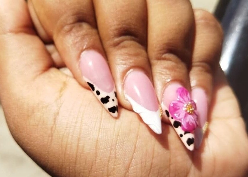 Elegant nail art with pink and floral designs at Nail Therapy, Laborie, Laborie, LC.
