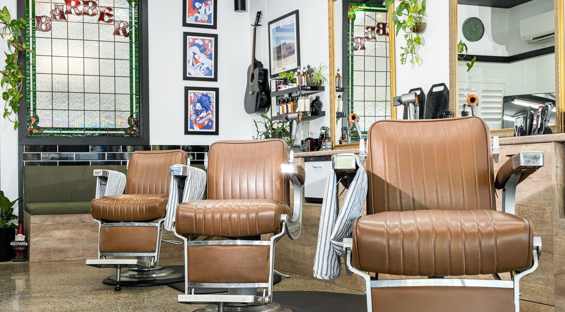 Vintage barber chairs at Broken Hearts Barbershop, Port Macquarie, New South Wales, AU with stylish decor.