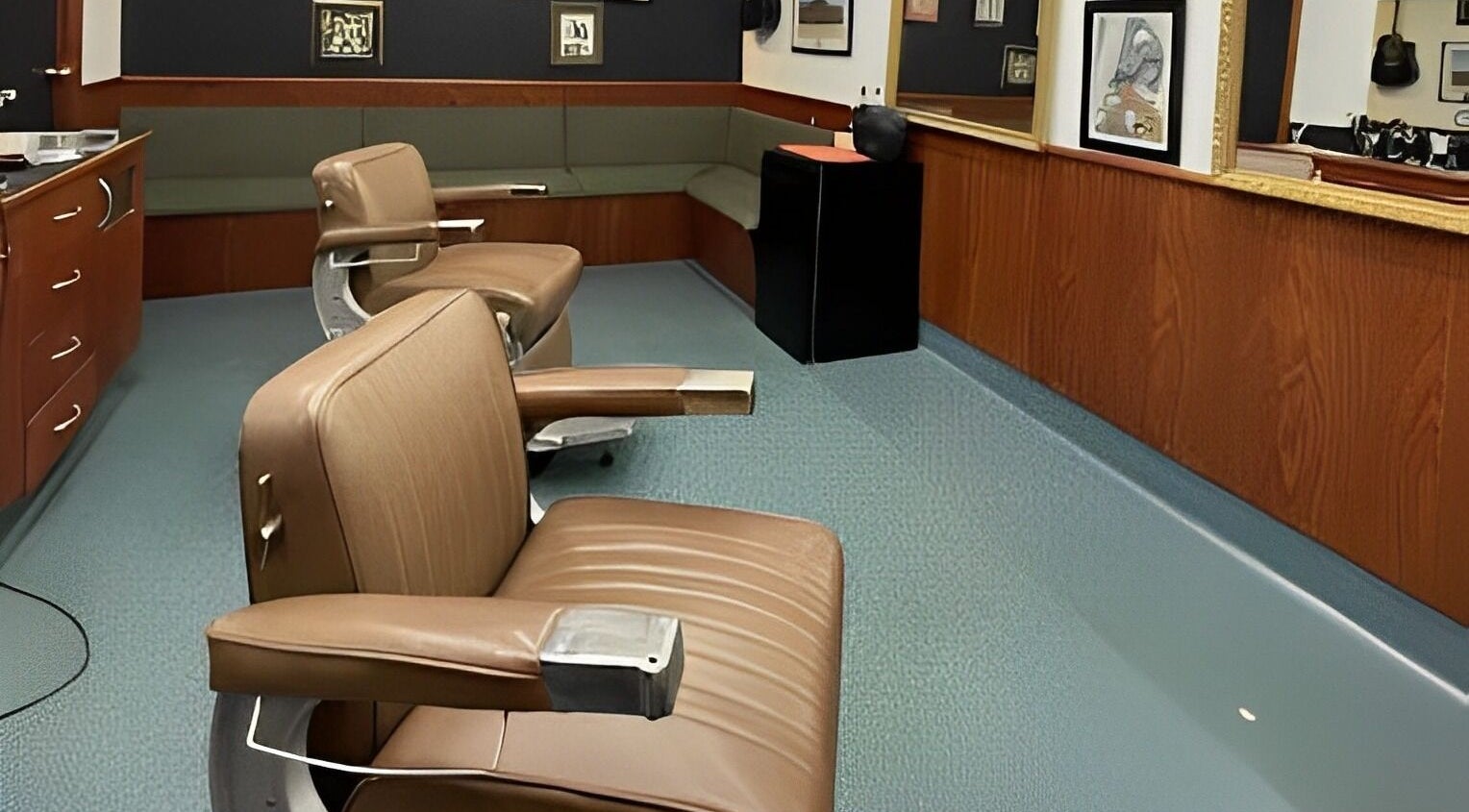 Cozy interior of Broken Hearts Barbershop in Port Macquarie, New South Wales, AU with vintage chairs and decor.