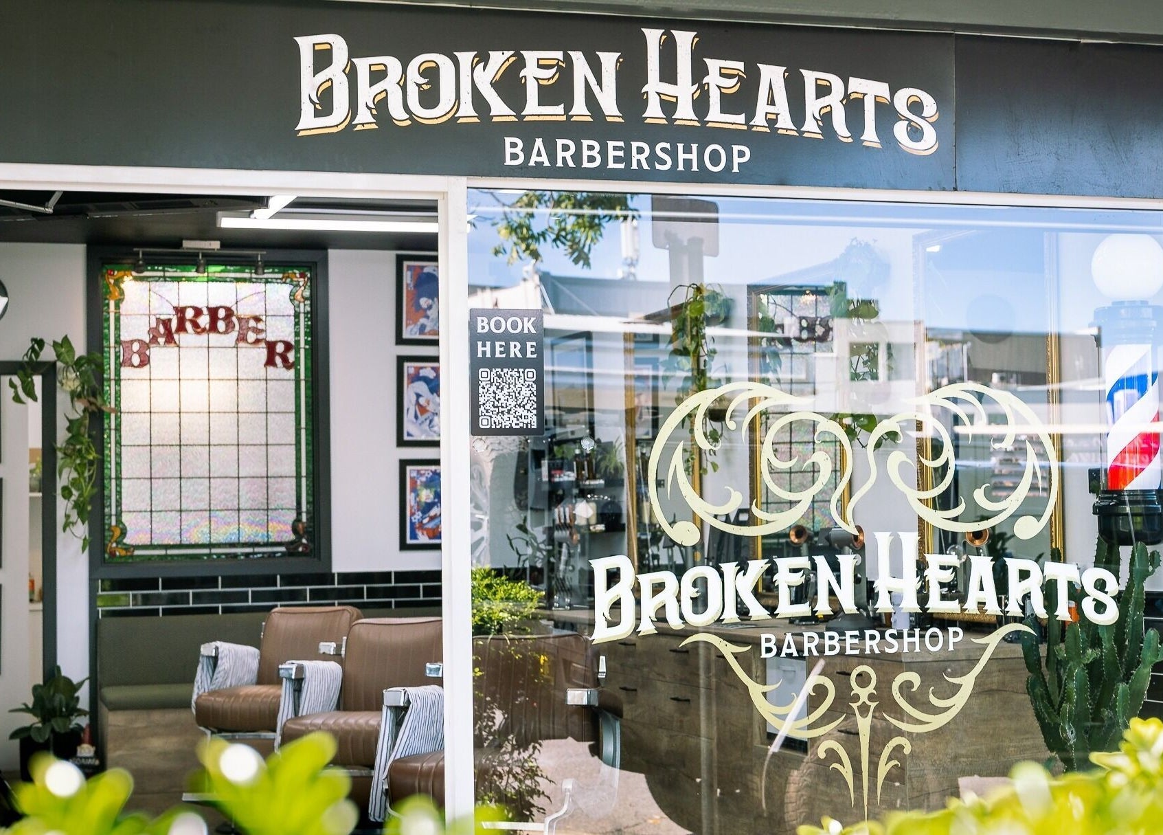 Exterior view of Broken Hearts Barbershop in Port Macquarie, New South Wales, AU with classic barber decor.