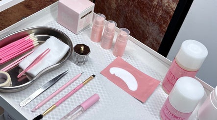 Pink beauty tools and products on a tray at Cosmetic Clinic in Calverley, England, GB.