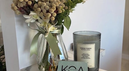 Elegant bouquet with candle at Gemma Gracie Hair Artistry, Applecross, Western Australia, AU.