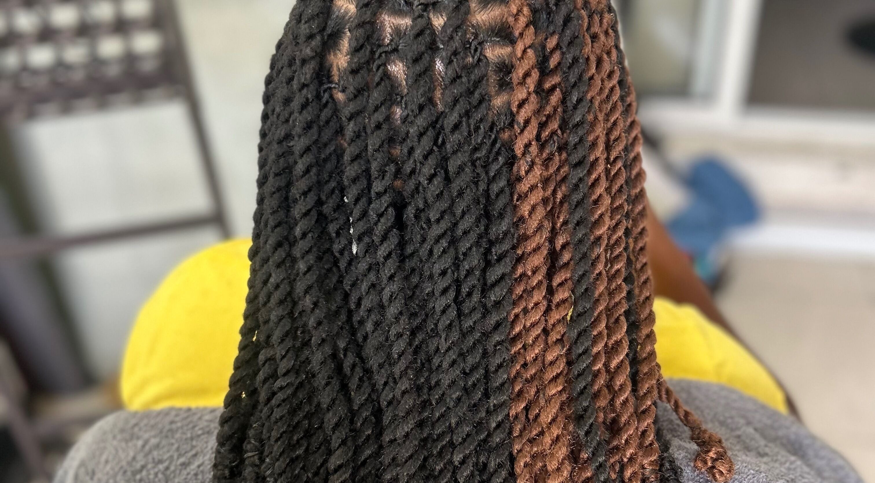 Intricate twist hairstyle at Styled by Tammy, Marigot, MF, showcasing expertly styled braids.