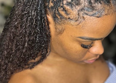 Close-up of braided hairstyle by Styled by Tammy in Marigot, MF, showcasing intricate hair design.