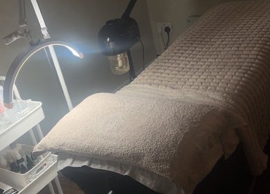 Relaxing treatment bed at ForEva Skin, Wishaw, Scotland, GB, ready for a serene beauty session.