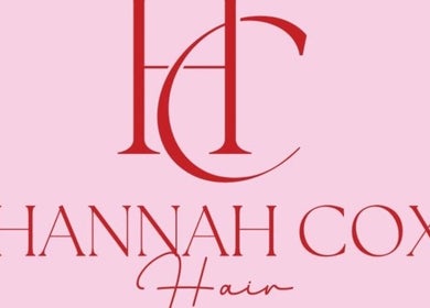 Hannah Cox Hair logo in red on a pink background, Reading, England, GB.