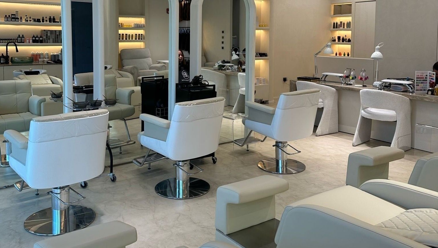 Sleek beauty salon space at Billionhairs Lounge Beauty Salon, Doha, Doha Municipality, QA with modern chairs.