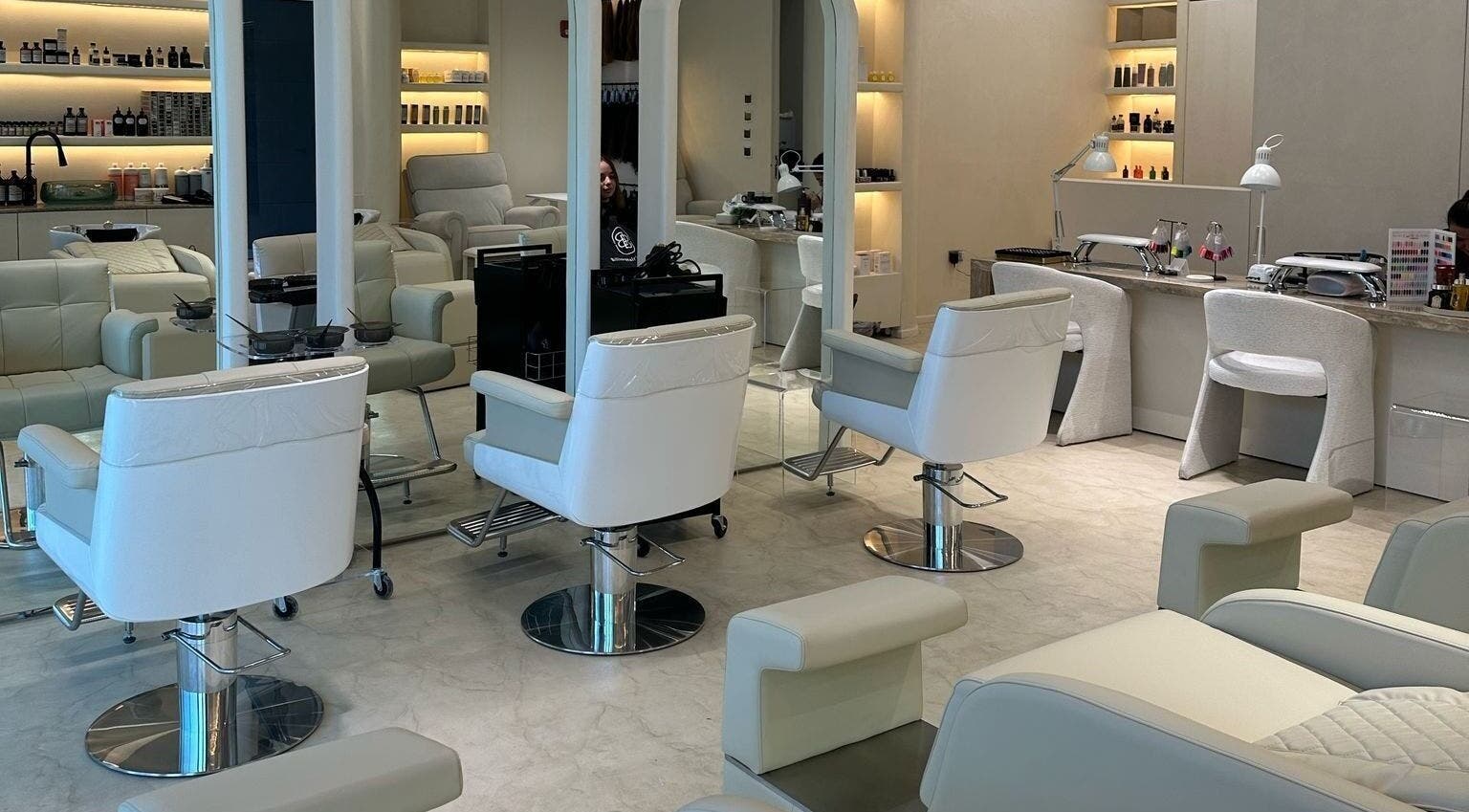 Sleek beauty salon space at Billionhairs Lounge Beauty Salon, Doha, Doha Municipality, QA with modern chairs.